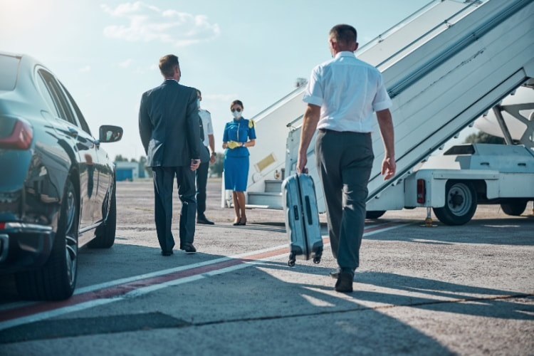 a passenger and crew member board a private jet